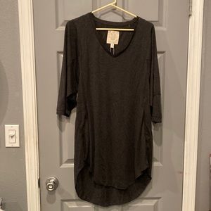 Charcoal shirttail dress with 3/4 sleeves. In perfect new condition.